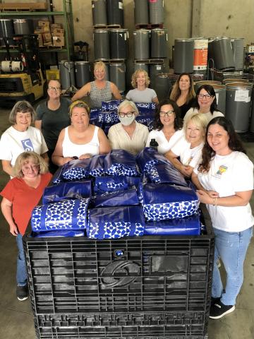 Service Project Group photo CANV bag stuffing